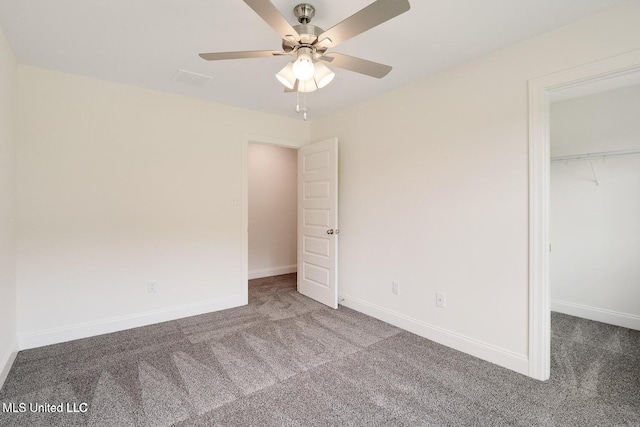 unfurnished bedroom featuring a closet, ceiling fan, and carpet flooring