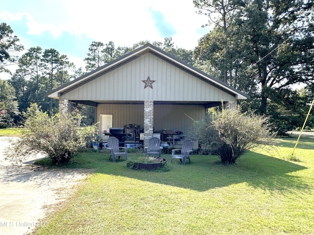 exterior space with a yard