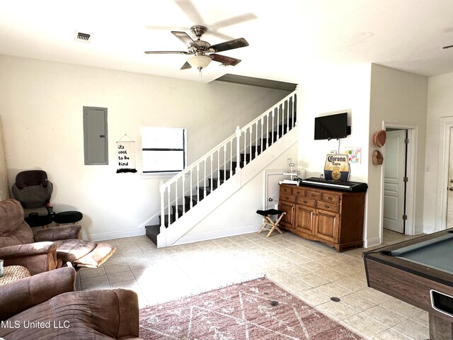 stairway with electric panel, tile patterned flooring, ceiling fan, and pool table