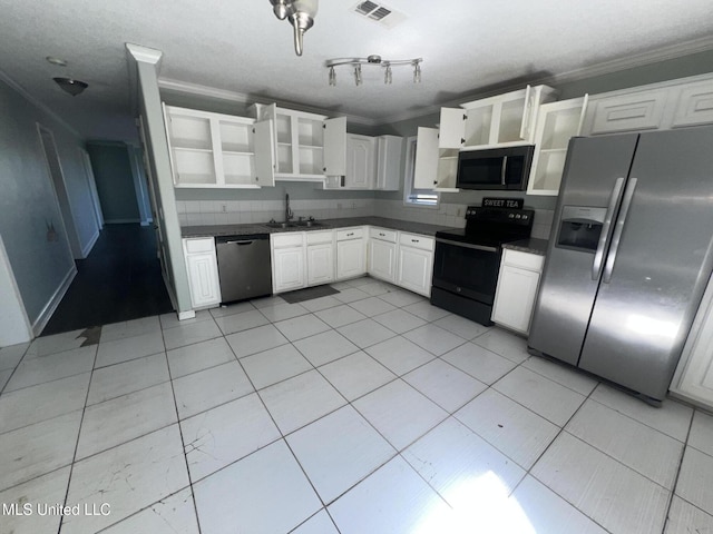 kitchen with visible vents, ornamental molding, open shelves, dark countertops, and stainless steel appliances