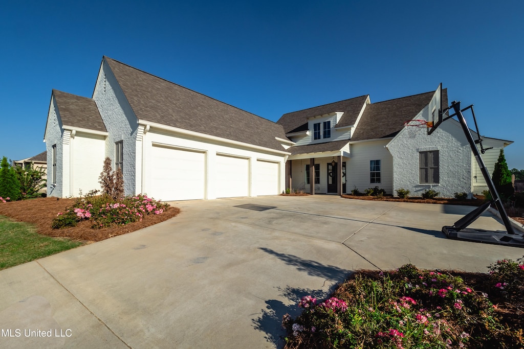 view of front of home with a garage