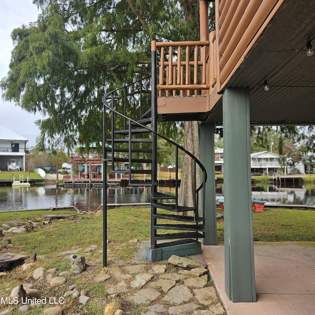 exterior space with a water view