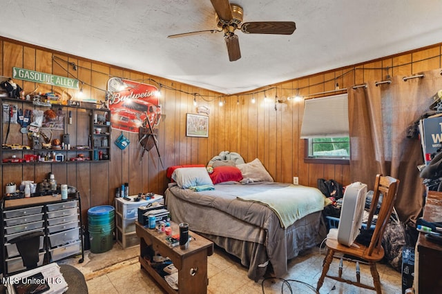 9 Gail St, Hattiesburg, MS 39402 - bedroom with wood walls and ceiling fan