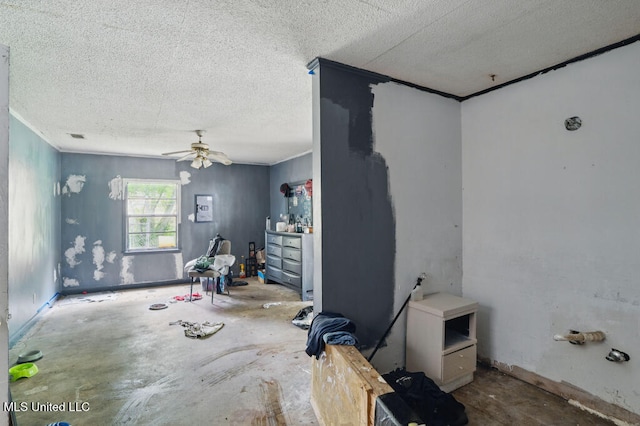 9 Gail St, Hattiesburg, MS 39402 - unfurnished room with a textured ceiling, a ceiling fan, unfinished concrete flooring, and crown molding