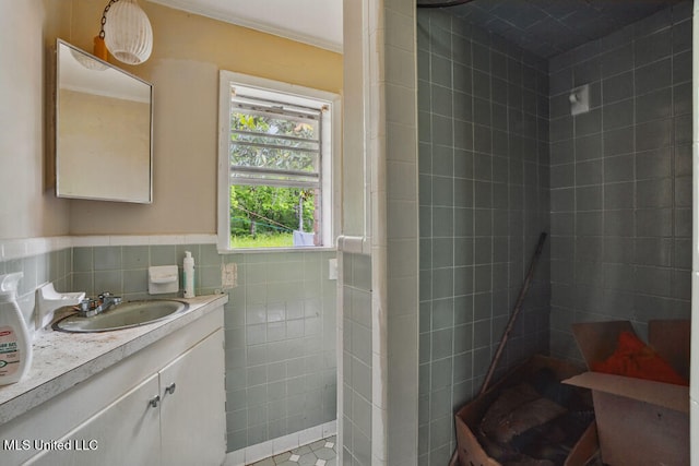 9 Gail St, Hattiesburg, MS 39402 - full bath with tile walls, a tile shower, vanity, and wainscoting