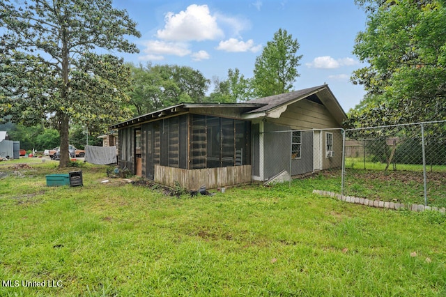 9 Gail St, Hattiesburg, MS 39402 - rear view of house with a sunroom