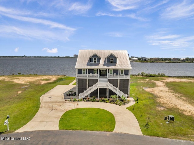 15225 Branigar, Biloxi, MS 39532 - beach home with a water view, stairway, a front lawn, a metal roof, and a porch