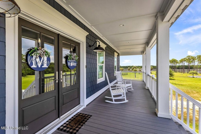 15225 Branigar, Biloxi, MS 39532 - wooden porch with french doors