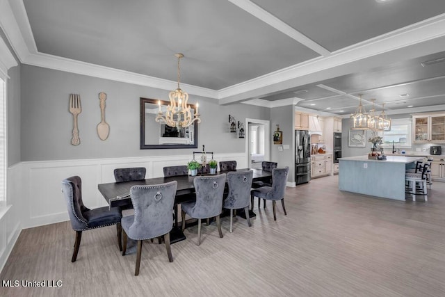 15225 Branigar, Biloxi, MS 39532 - dining area featuring a chandelier, light wood-type flooring, a wainscoted wall, crown molding, and recessed lighting