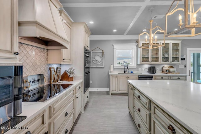 15225 Branigar, Biloxi, MS 39532 - kitchen featuring black appliances, a chandelier, custom range hood, cream cabinetry, and recessed lighting