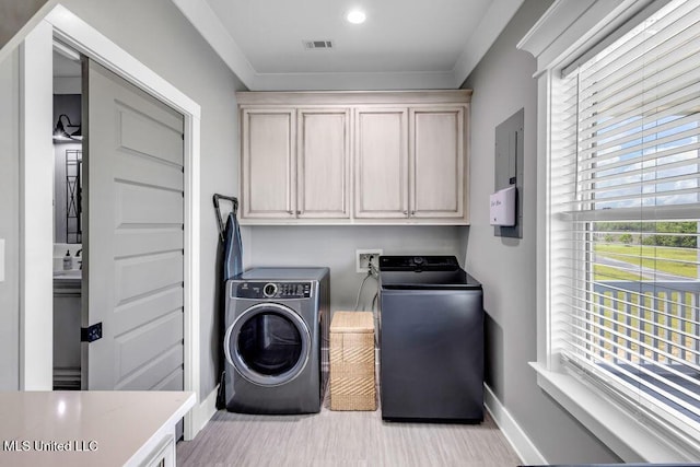 15225 Branigar, Biloxi, MS 39532 - laundry room featuring washing machine and dryer and cabinet space