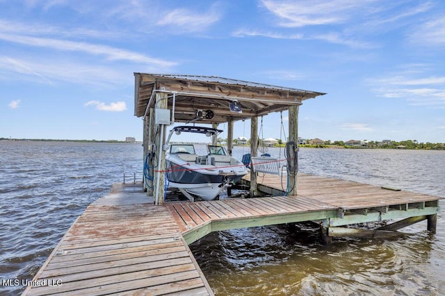 15225 Branigar, Biloxi, MS 39532 - dock area featuring boat lift and a water view