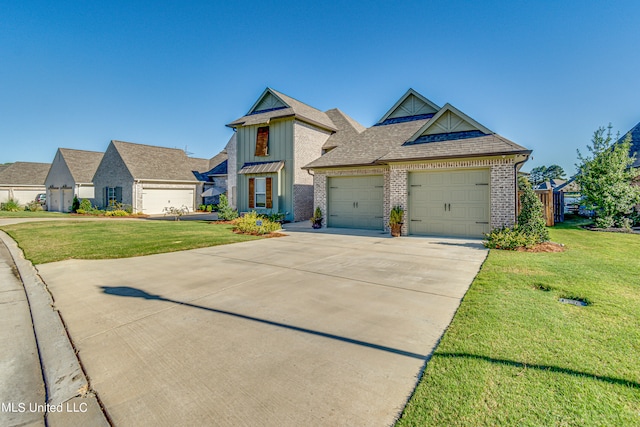 view of front of house with a garage and a front lawn