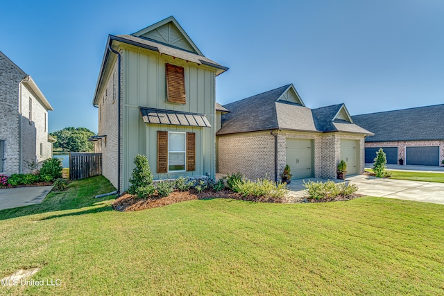 view of front facade featuring a front yard and a garage