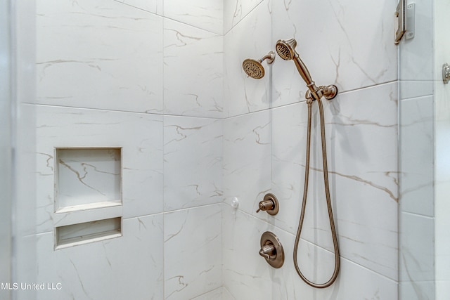 room details with a tile shower