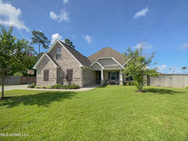 5807 Sylvester St, Ocean Springs, MS 39564 - view of front of home with brick siding and roof with shingles