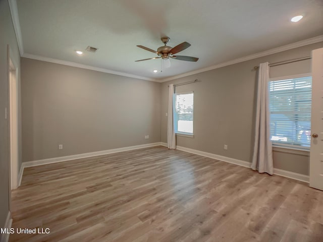 5807 Sylvester St, Ocean Springs, MS 39564 - empty room with ceiling fan, light wood-style flooring, baseboards, recessed lighting, and ornamental molding