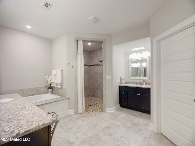 5807 Sylvester St, Ocean Springs, MS 39564 - full bath featuring a shower stall, vanity, a bath, tile patterned flooring, and recessed lighting
