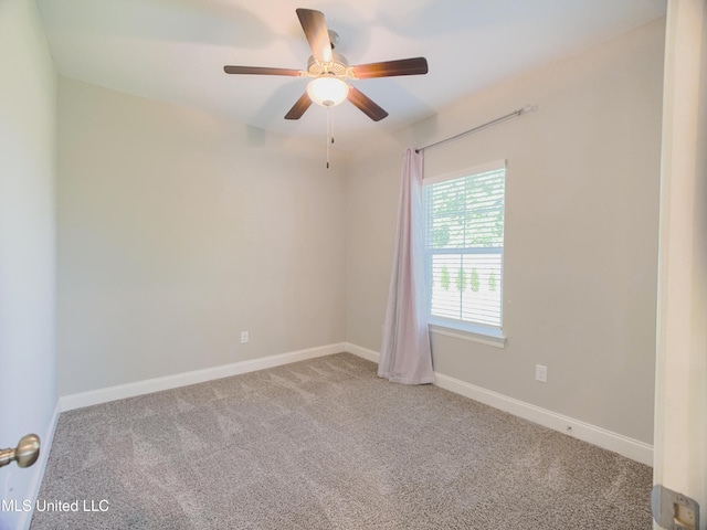 5807 Sylvester St, Ocean Springs, MS 39564 - carpeted spare room with ceiling fan and baseboards