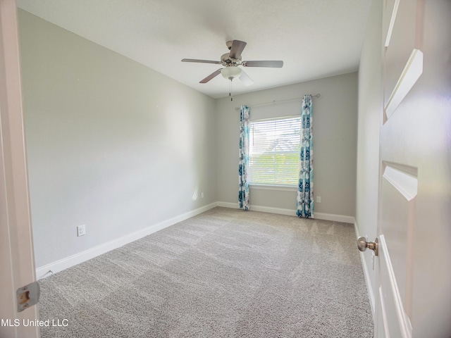 5807 Sylvester St, Ocean Springs, MS 39564 - carpeted spare room featuring a ceiling fan and baseboards