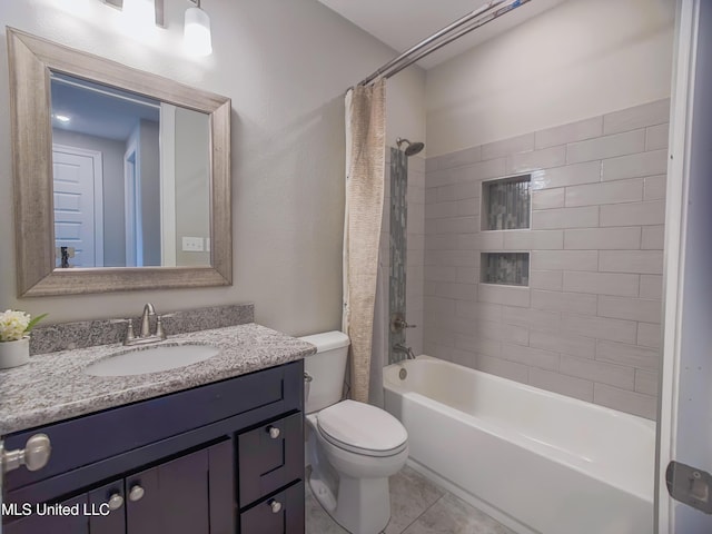 5807 Sylvester St, Ocean Springs, MS 39564 - bathroom featuring toilet, vanity, shower / bath combo, and tile patterned floors