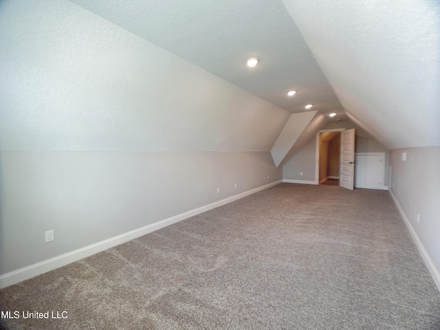 5807 Sylvester St, Ocean Springs, MS 39564 - additional living space with carpet flooring, vaulted ceiling, baseboards, and recessed lighting