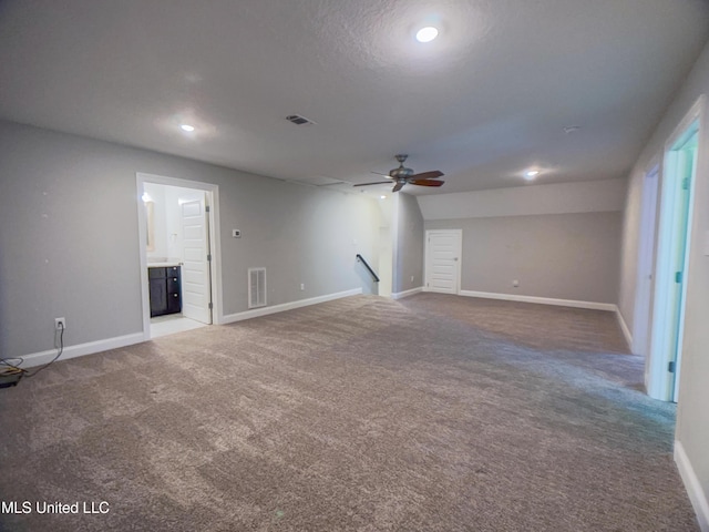 5807 Sylvester St, Ocean Springs, MS 39564 - unfurnished living room with carpet, baseboards, a ceiling fan, and recessed lighting