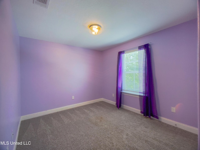 5807 Sylvester St, Ocean Springs, MS 39564 - carpeted spare room with baseboards