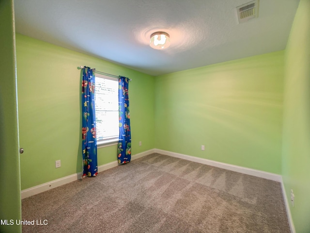 5807 Sylvester St, Ocean Springs, MS 39564 - carpeted spare room featuring baseboards