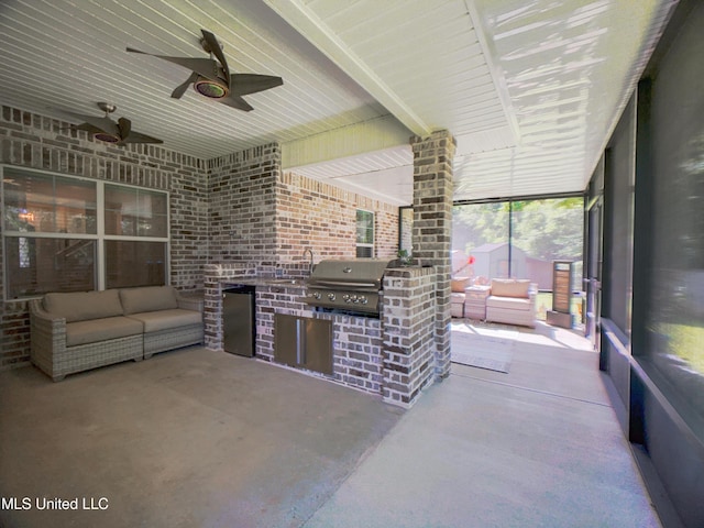 5807 Sylvester St, Ocean Springs, MS 39564 - unfurnished sunroom with an outdoor kitchen, a ceiling fan, and beamed ceiling