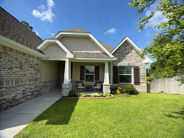 5807 Sylvester St, Ocean Springs, MS 39564 - view of front of home featuring covered porch, a shingled roof, and stucco siding
