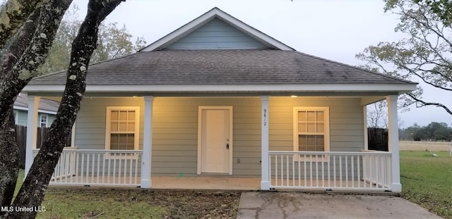 bungalow-style home featuring a porch