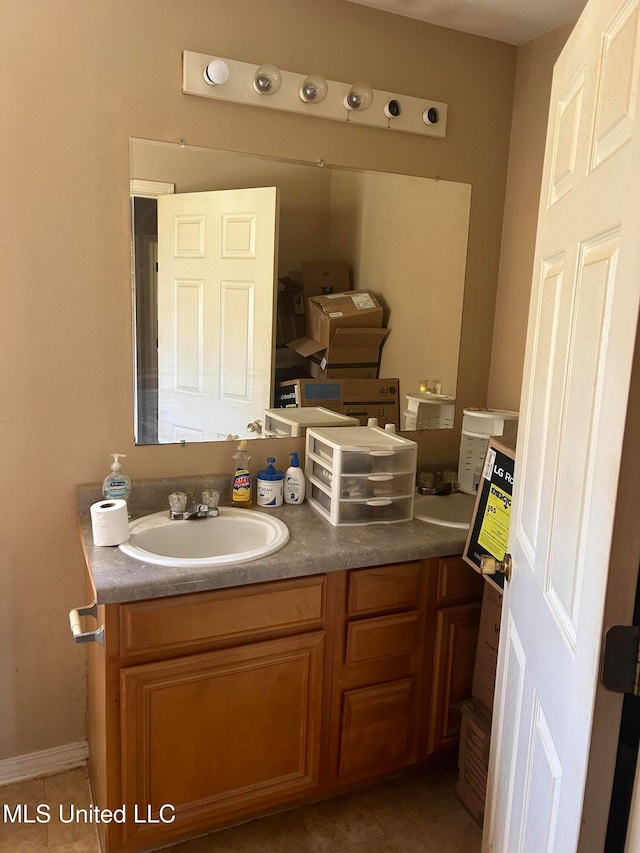 bathroom featuring vanity and tile patterned floors