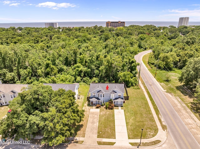 birds eye view of property featuring a water view