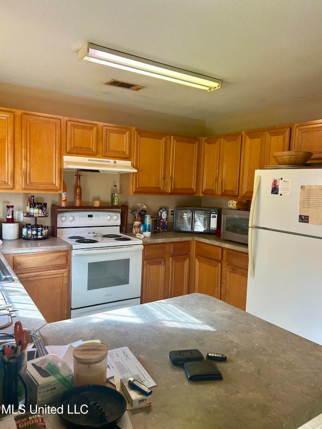 kitchen featuring white appliances