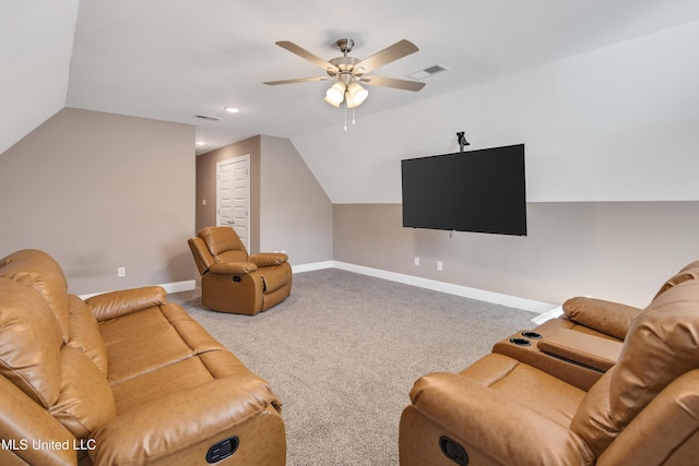 living room featuring visible vents, vaulted ceiling, and carpet flooring