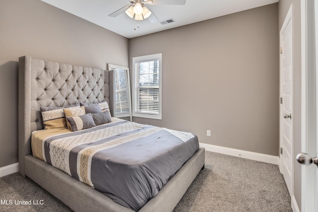 bedroom with carpet, visible vents, baseboards, and ceiling fan