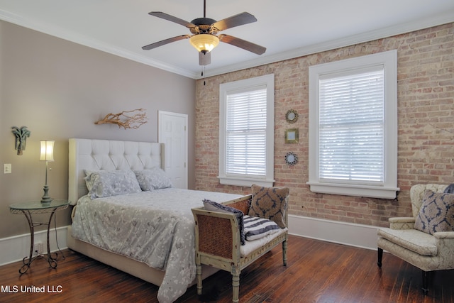 bedroom with dark hardwood / wood-style floors, ceiling fan, ornamental molding, and brick wall