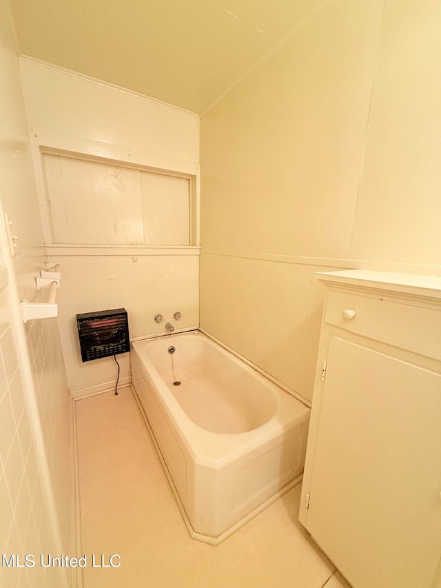 bathroom with a washtub