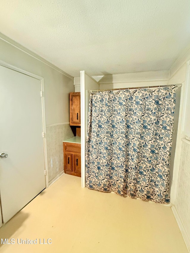 interior space with a textured ceiling