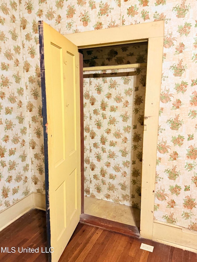 bathroom with wood-type flooring