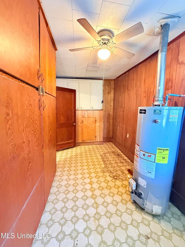 utility room with water heater