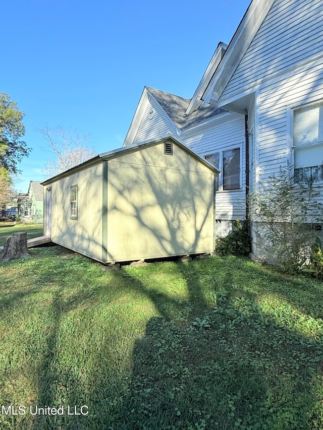 view of home's exterior featuring a lawn