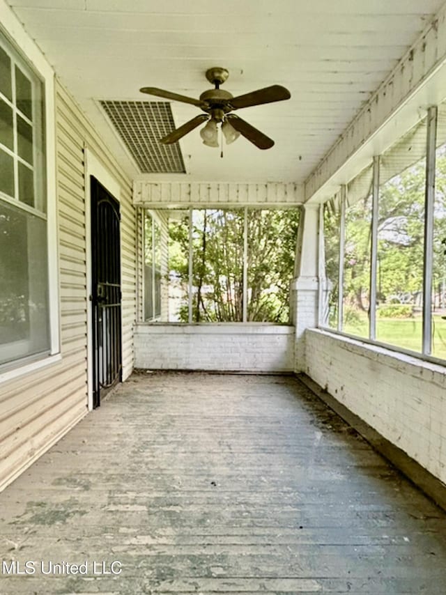 2305 Grenada Blvd, Greenwood, MS 38930 - unfurnished sunroom with ceiling fan and plenty of natural light