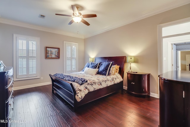 2011 Pointe Clear Dr, Biloxi, MS 39531 - bedroom featuring baseboards, dark wood-style flooring, ornamental molding, multiple windows, and ceiling fan