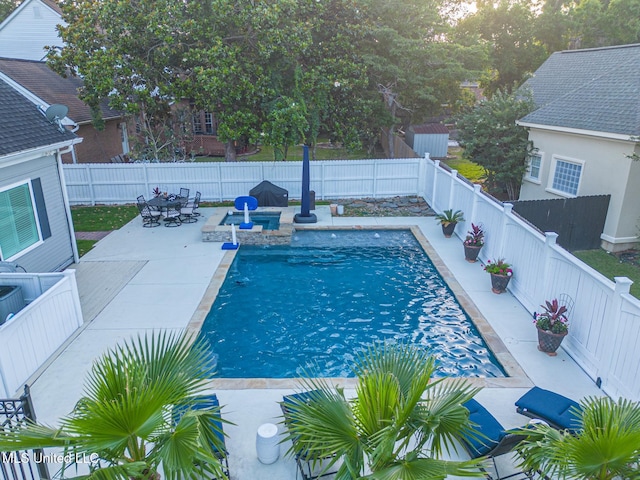2011 Pointe Clear Dr, Biloxi, MS 39531 - view of pool featuring a fenced backyard, a patio area, and a pool with connected hot tub