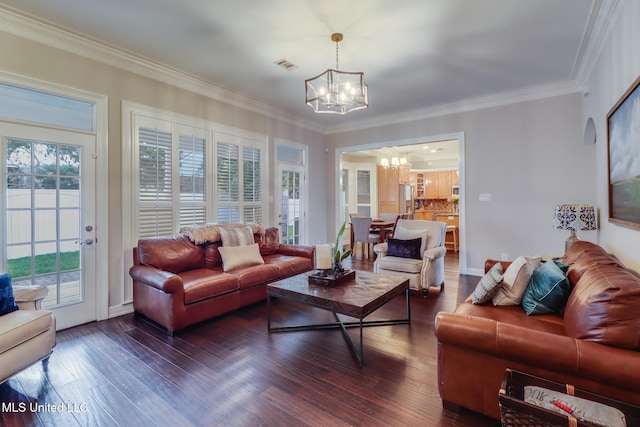 2011 Pointe Clear Dr, Biloxi, MS 39531 - living area with a chandelier, dark wood-type flooring, and ornamental molding