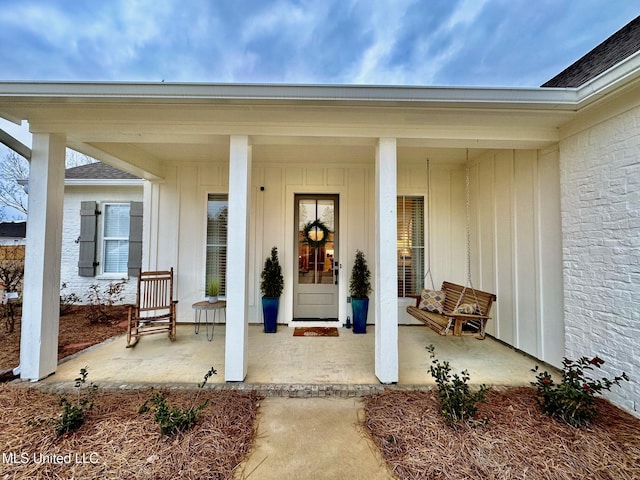 entrance to property with covered porch