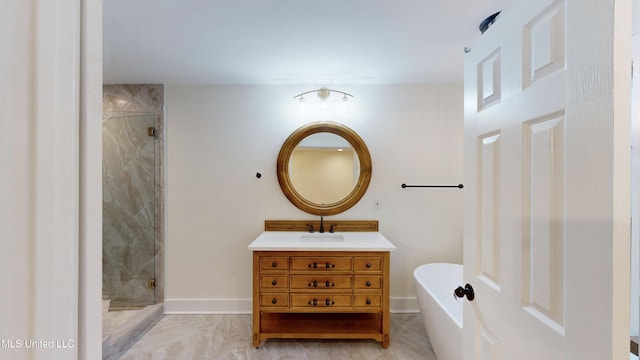 bathroom featuring vanity and shower with separate bathtub