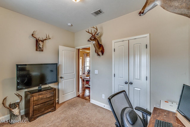 office with light colored carpet